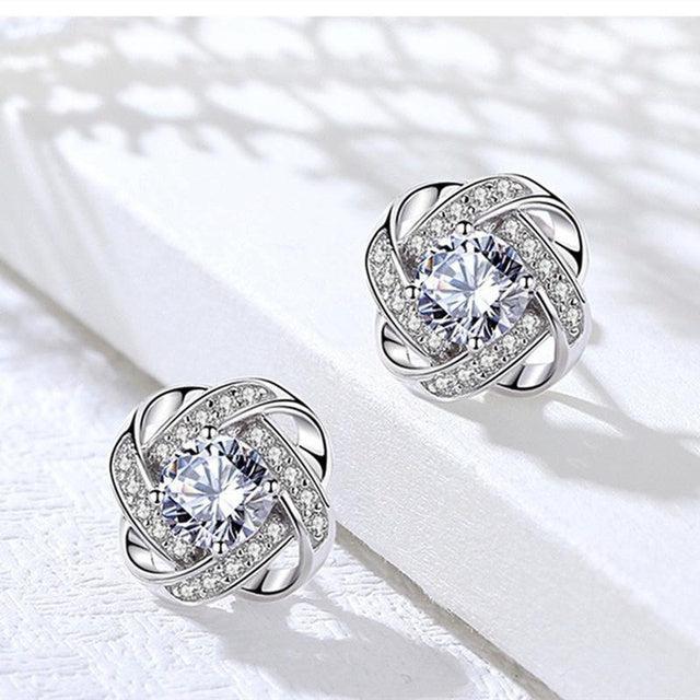 Boucles d'oreilles Croix Spirale Fleur