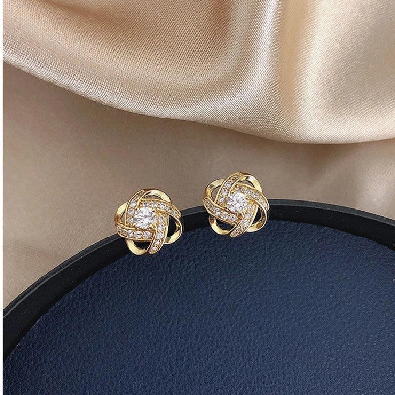 Boucles d'oreilles Croix Spirale Fleur