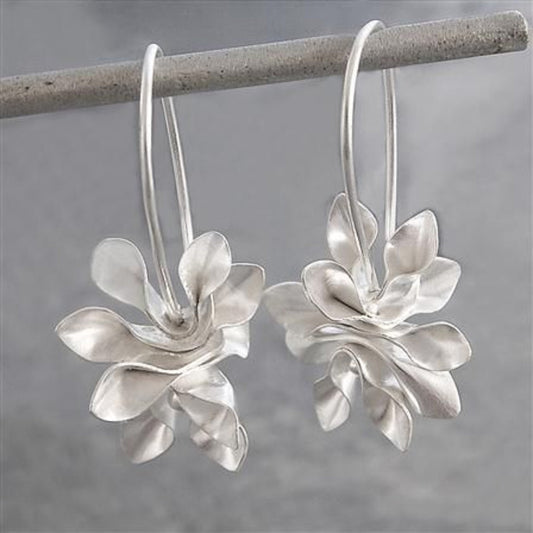Boucles d'oreilles vintage fleur irrégulière en argent