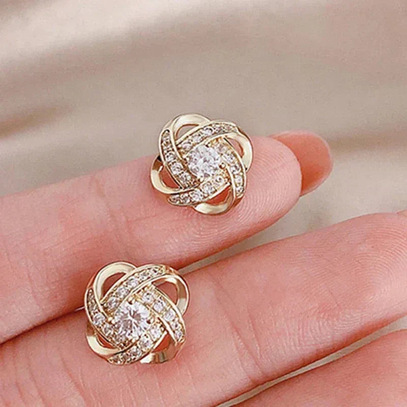 Boucles d'oreilles Croix Spirale Fleur
