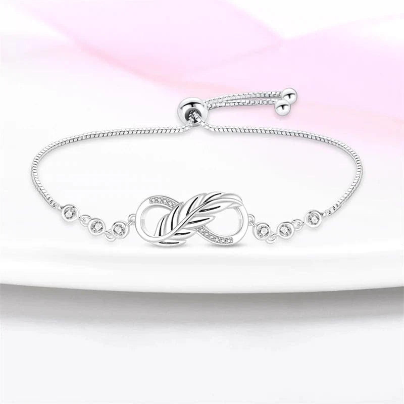 Bracelet Élégant Nœud Infini aux Accents de Cristal