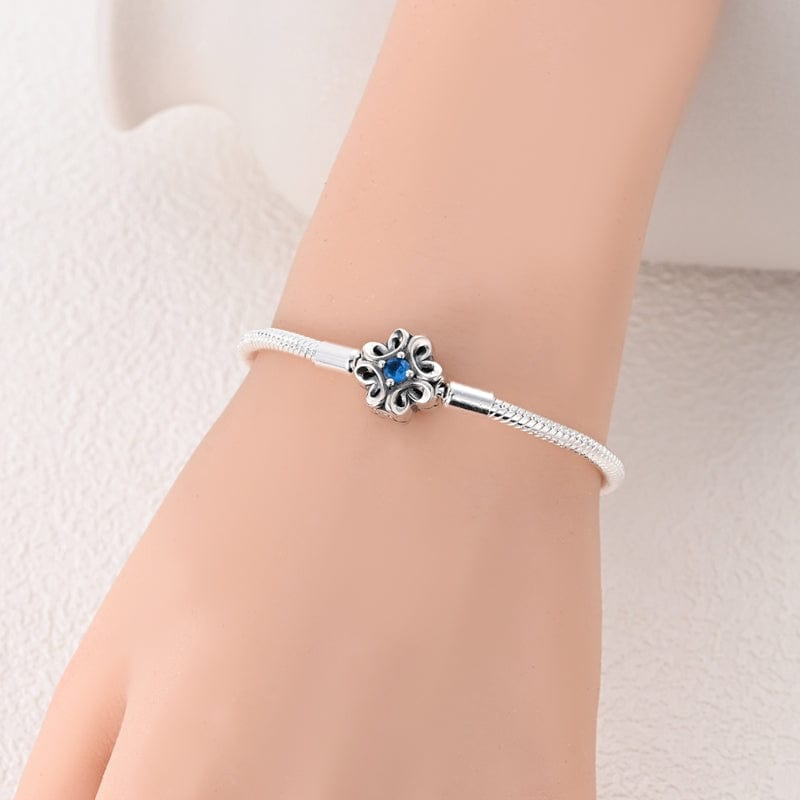 Bracelet Élégance Florale à Pierre Bleue