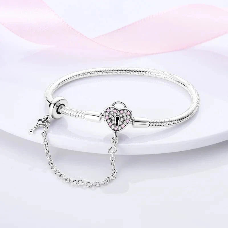 Bracelet à Charms Cadenas Cœur avec Accents Roses et Chaîne de Sécurité