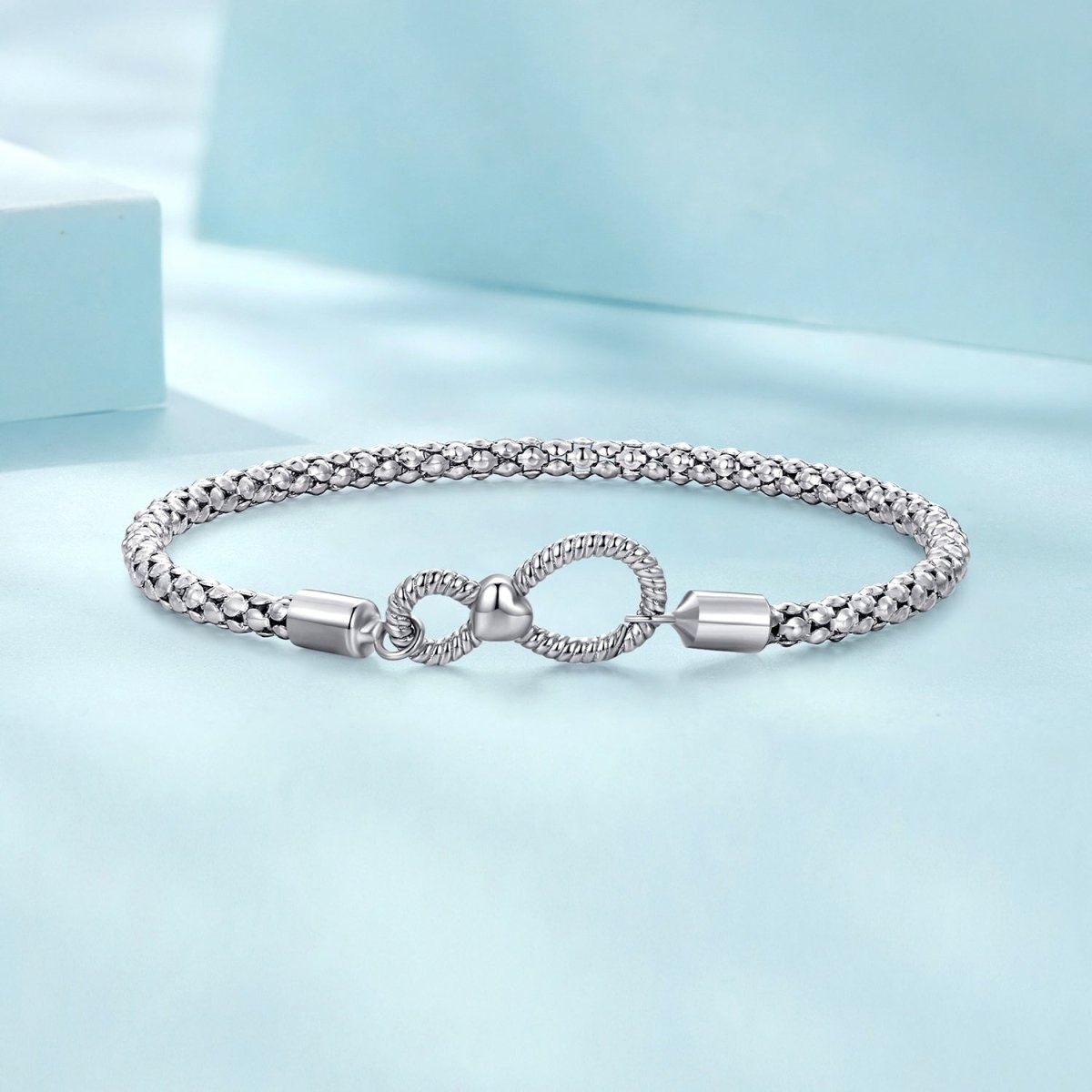 Bracelet à Charms Tressé avec Fermoir Infini