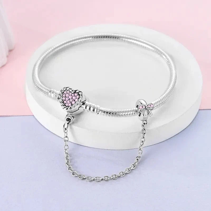 Bracelet à Charms Cœur en Cristal Rose avec Nœud et Chaîne de Sécurité