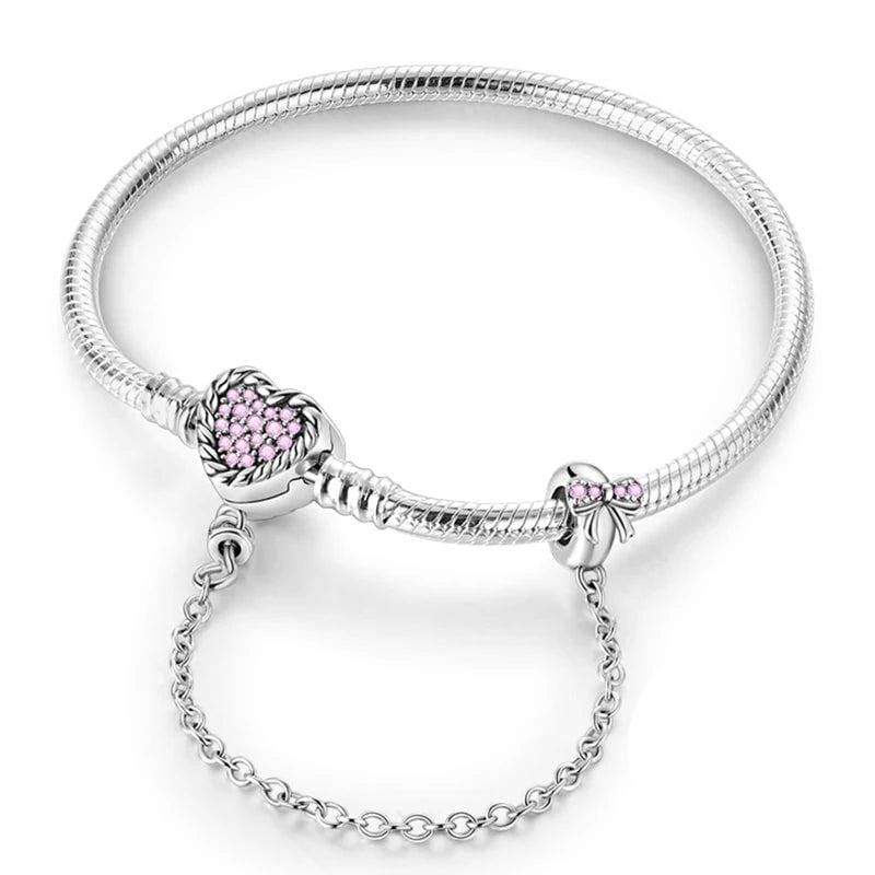Bracelet à Charms Cœur en Cristal Rose avec Nœud et Chaîne de Sécurité