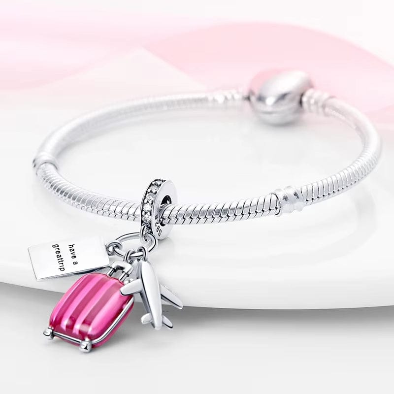 Charm Triple Pendant Avion, Passeport et Valise Rose