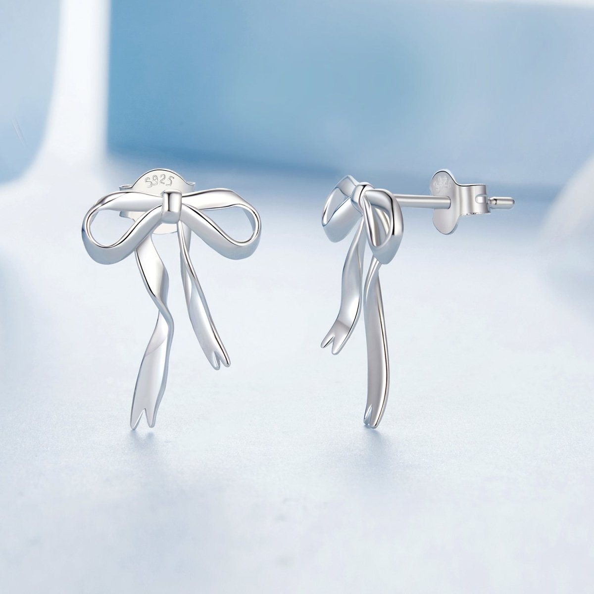 Puces d'Oreilles Nœud Ruban